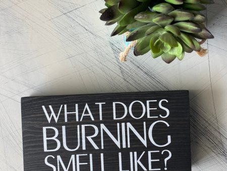 What does burning smell like? Sale